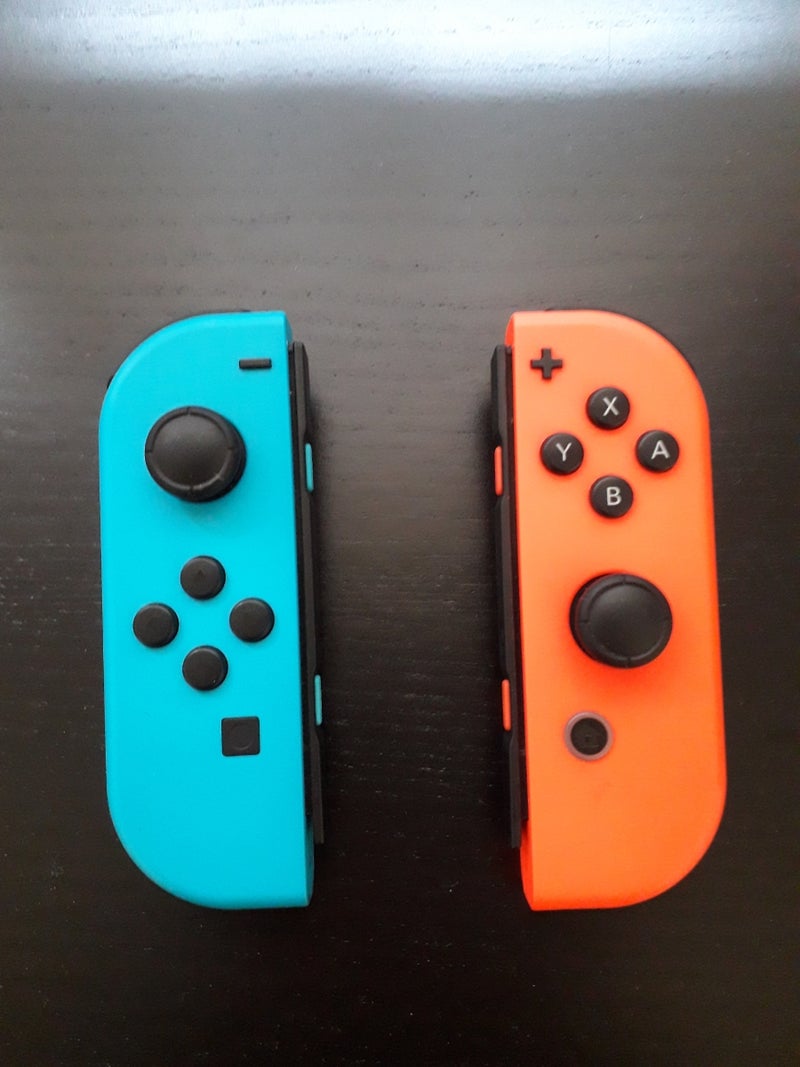 joycons Nintendo switch rojo y azul neón 